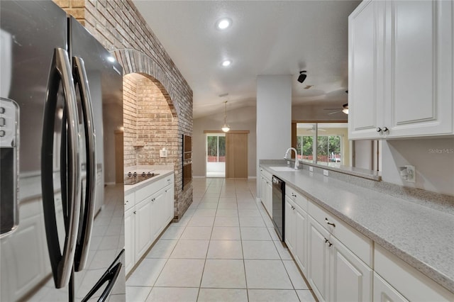 6801 Bishops Pointe Way, Riverview, FL 33578 - kitchen featuring black appliances, lofted ceiling, a ceiling fan, white cabinets, and light tile patterned floors