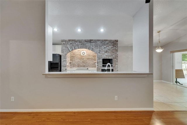6801 Bishops Pointe Way, Riverview, FL 33578 - unfurnished living room with lofted ceiling, recessed lighting, and light wood-type flooring