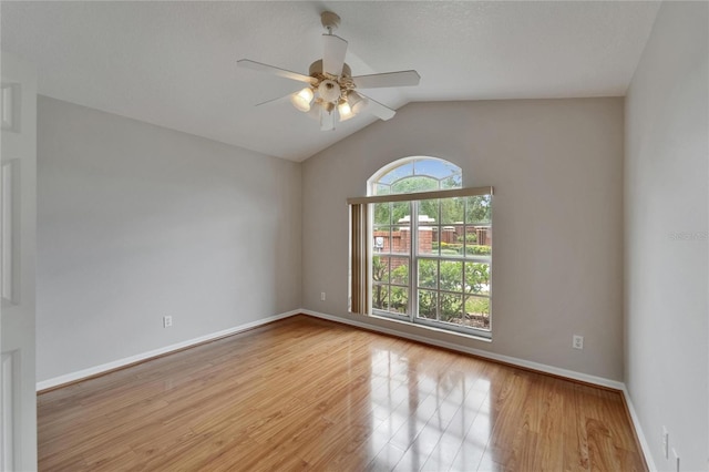 6801 Bishops Pointe Way, Riverview, FL 33578 - unfurnished room featuring ceiling fan, wood finished floors, and vaulted ceiling