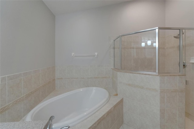 6801 Bishops Pointe Way, Riverview, FL 33578 - bathroom with a garden tub and tiled shower