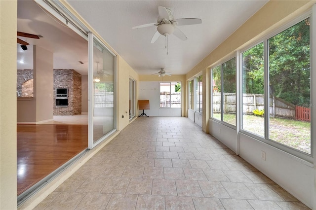 6801 Bishops Pointe Way, Riverview, FL 33578 - unfurnished sunroom with lofted ceiling and baseboards