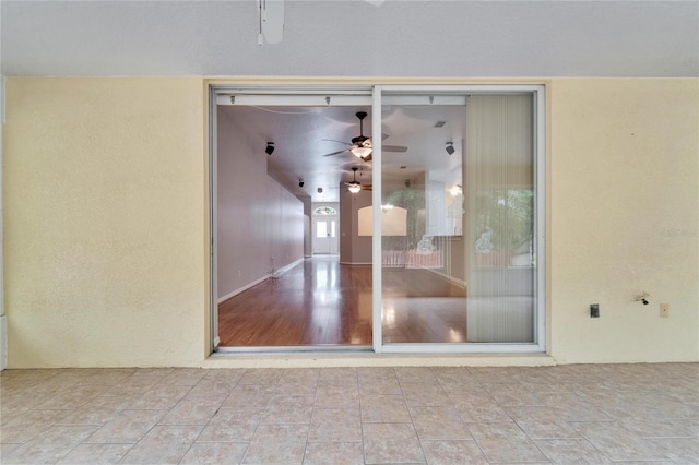 6801 Bishops Pointe Way, Riverview, FL 33578 - doorway to property with a ceiling fan, stucco siding, and a patio