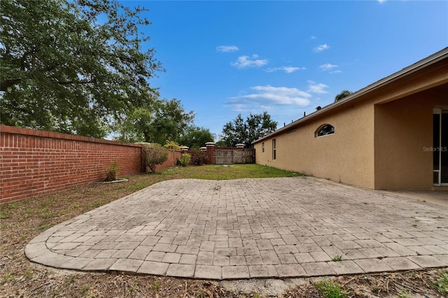 6801 Bishops Pointe Way, Riverview, FL 33578 - fenced backyard featuring a patio