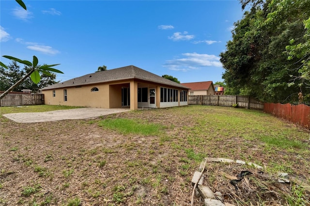6801 Bishops Pointe Way, Riverview, FL 33578 - rear view of property with a patio area, a fenced backyard, and stucco siding