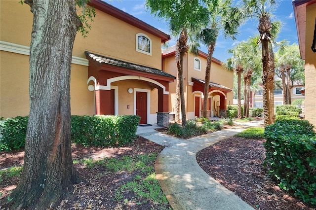 2220 Chianti Pl Unit 8-0828, Palm Harbor, FL 34683 - view of front of property featuring stucco siding