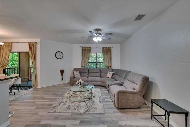 2220 Chianti Pl Unit 8-0828, Palm Harbor, FL 34683 - living room featuring wood finished floors, ceiling fan, and baseboards