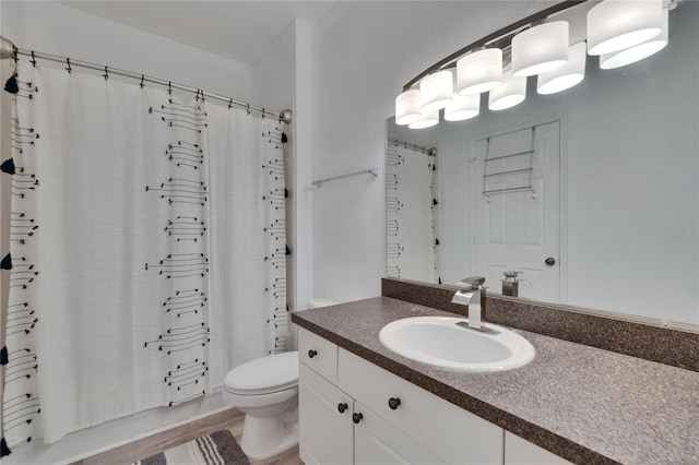 2220 Chianti Pl Unit 8-0828, Palm Harbor, FL 34683 - bathroom featuring toilet, vanity, wood finished floors, and shower / bath combination with curtain