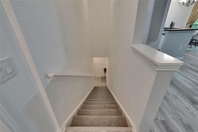 2220 Chianti Pl Unit 8-0828, Palm Harbor, FL 34683 - stairs with wood finished floors and baseboards