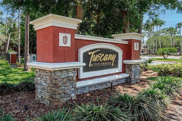 2220 Chianti Pl Unit 8-0828, Palm Harbor, FL 34683 - community / neighborhood sign featuring view of wooded area