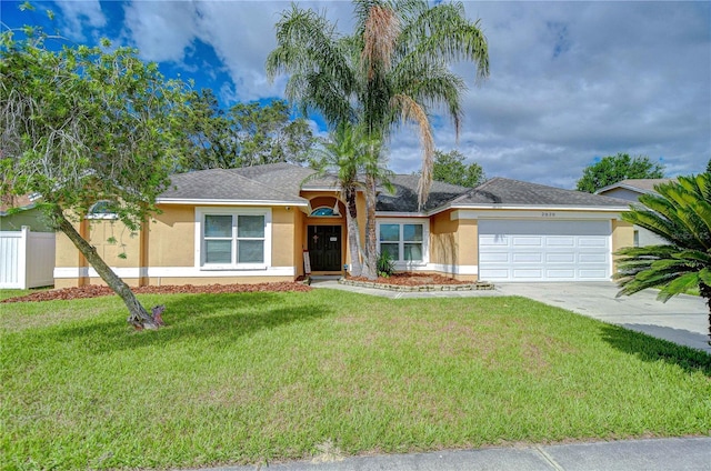 2020 Elk Spring Dr, Brandon, FL 33511 - ranch-style home with stucco siding, an attached garage, and driveway