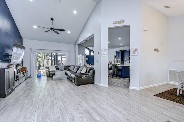 2020 Elk Spring Dr, Brandon, FL 33511 - living area with a ceiling fan, high vaulted ceiling, light wood-style flooring, baseboards, and recessed lighting