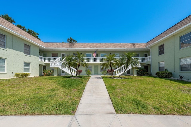 1250 S Pinellas Ave Unit 214, Tarpon Springs, FL 34689 - view of building exterior featuring stairs