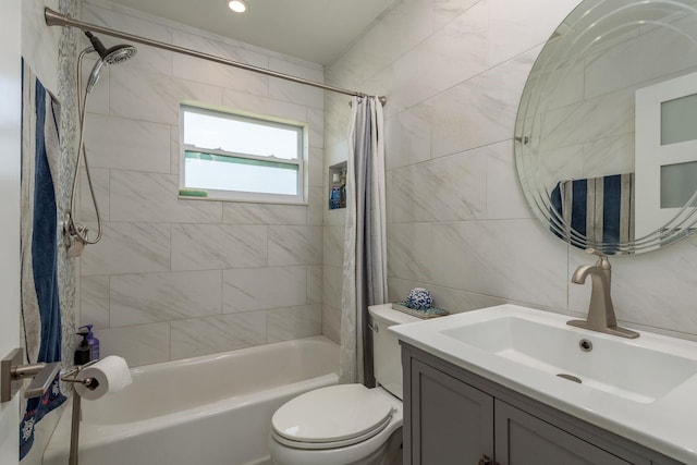 1250 S Pinellas Ave Unit 214, Tarpon Springs, FL 34689 - full bathroom featuring shower / bath combo, toilet, vanity, and tile walls