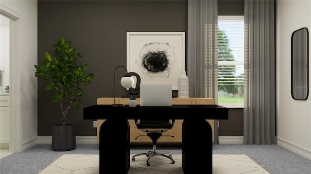 home office featuring carpet and baseboards