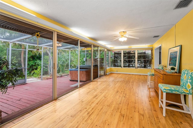 2485 Indigo Dr, Clearwater, FL 33763 - sunroom / solarium featuring a hot tub and a ceiling fan
