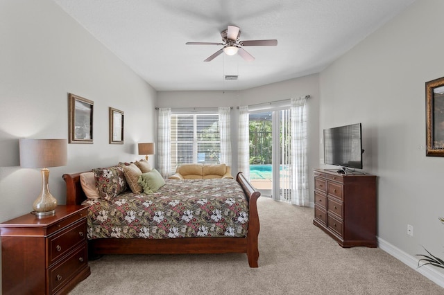 17318 Emerald Chase Dr, Tampa, FL 33647 - bedroom with access to exterior, light colored carpet, a ceiling fan, and baseboards