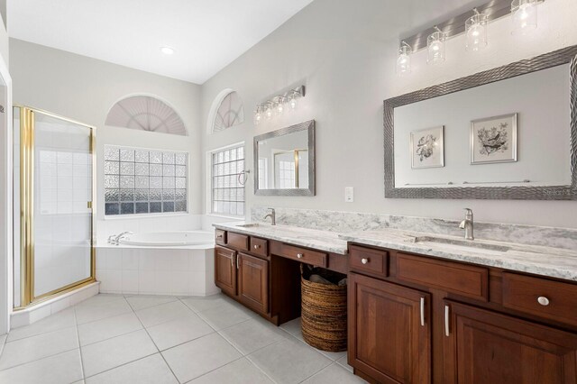 17318 Emerald Chase Dr, Tampa, FL 33647 - bathroom with a shower stall, a bath, double vanity, and tile patterned floors