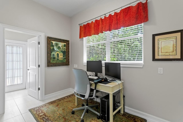 17318 Emerald Chase Dr, Tampa, FL 33647 - tiled home office featuring baseboards