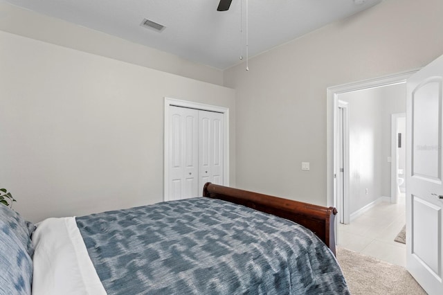17318 Emerald Chase Dr, Tampa, FL 33647 - bedroom with light tile patterned flooring, a closet, and a ceiling fan