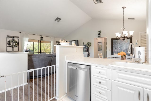 5666 Gardens Dr Unit 202, Sarasota, FL 34243 - bathroom featuring vaulted ceiling, a chandelier, vanity, and wood finished floors