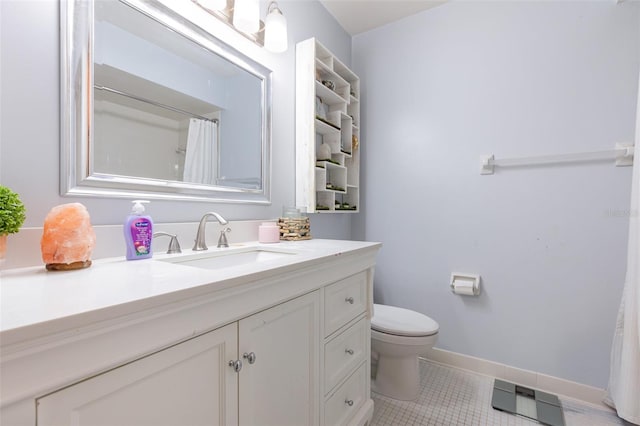 5666 Gardens Dr Unit 202, Sarasota, FL 34243 - full bath featuring tile patterned floors, baseboards, vanity, toilet, and a shower with curtain
