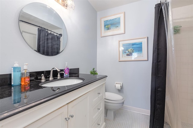 5666 Gardens Dr Unit 202, Sarasota, FL 34243 - full bathroom featuring tile patterned flooring, toilet, vanity, a tile shower, and baseboards