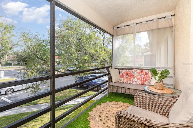 5666 Gardens Dr Unit 202, Sarasota, FL 34243 - sunroom with lofted ceiling