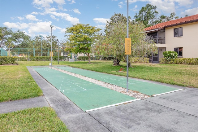 5666 Gardens Dr Unit 202, Sarasota, FL 34243 - view of home's community featuring shuffleboard