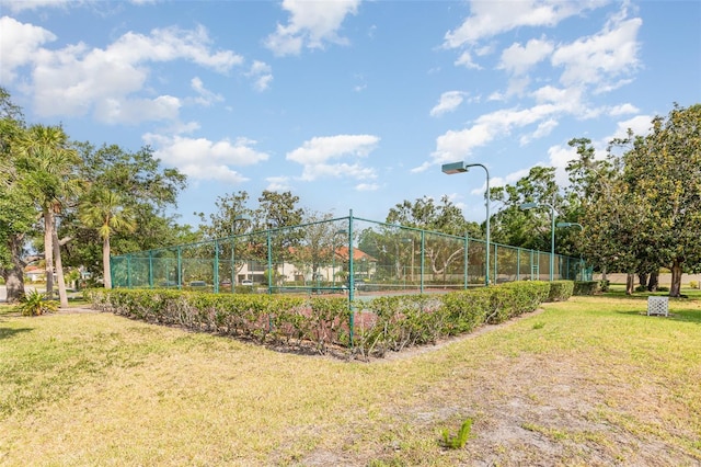 5666 Gardens Dr Unit 202, Sarasota, FL 34243 - surrounding community featuring a tennis court