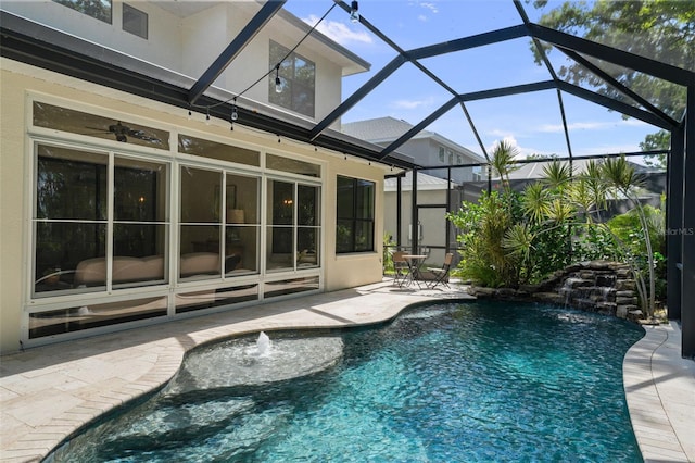 12705 Green Heron Way, Odessa, FL 33556 - swimming pool with a patio and glass enclosure