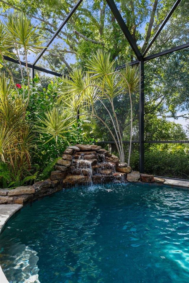 12705 Green Heron Way, Odessa, FL 33556 - outdoor pool with glass enclosure