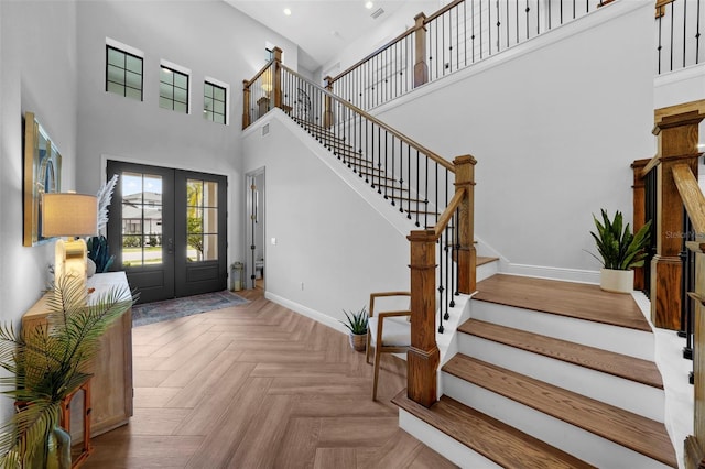 12705 Green Heron Way, Odessa, FL 33556 - entryway with french doors, recessed lighting, stairway, baseboards, and a high ceiling