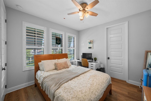 12705 Green Heron Way, Odessa, FL 33556 - bedroom featuring multiple windows, wood finished floors, baseboards, and an office area