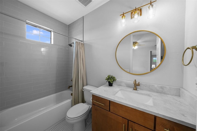 12705 Green Heron Way, Odessa, FL 33556 - full bathroom featuring toilet, vanity, shower / tub combo, and ceiling fan
