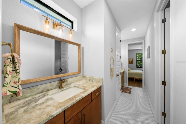 12705 Green Heron Way, Odessa, FL 33556 - bathroom with vanity, baseboards, recessed lighting, ensuite bath, and tile patterned floors