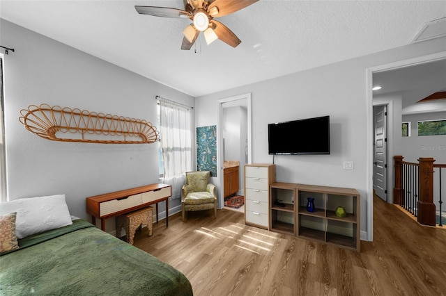 12705 Green Heron Way, Odessa, FL 33556 - bedroom featuring wood finished floors, baseboards, and a ceiling fan