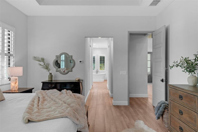 12705 Green Heron Way, Odessa, FL 33556 - bedroom featuring light wood-type flooring and baseboards