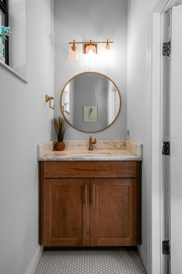 12705 Green Heron Way, Odessa, FL 33556 - bathroom with vanity and baseboards
