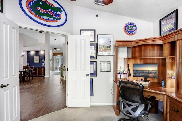 office featuring a ceiling fan, baseboards, wood finished floors, and high vaulted ceiling