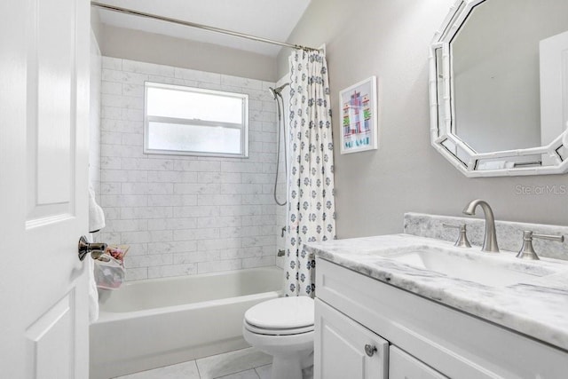 bathroom featuring toilet, shower / tub combo, vanity, and tile patterned flooring