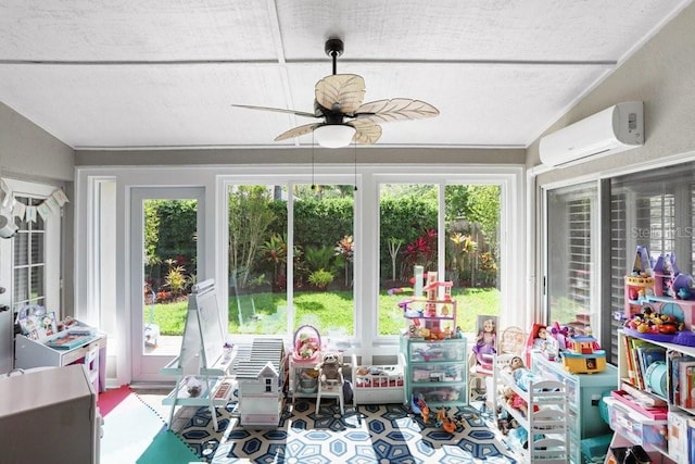 sunroom / solarium with a wall unit AC and healthy amount of natural light