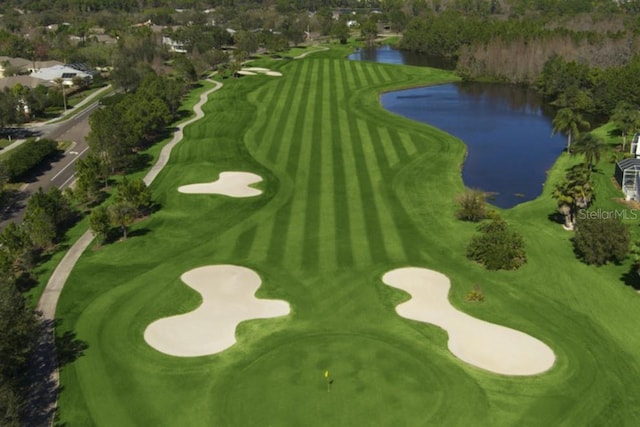 bird's eye view of a large body of water and a golf course