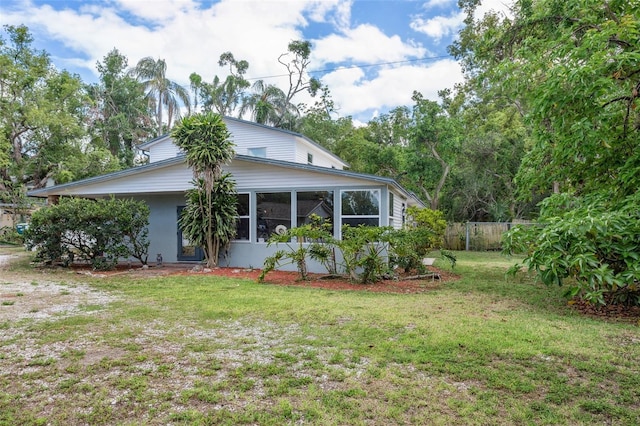 2814 W Humphrey St, Tampa, FL 33614 - view of side of home featuring a sunroom