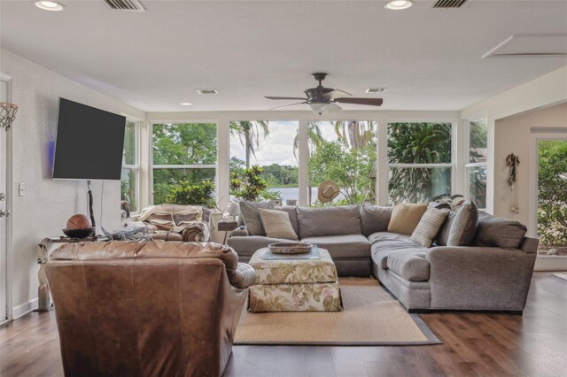 2814 W Humphrey St, Tampa, FL 33614 - living room with wood finished floors, ceiling fan, and recessed lighting