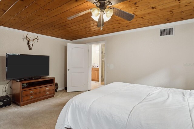 2814 W Humphrey St, Tampa, FL 33614 - bedroom featuring wooden ceiling, ornamental molding, light carpet, and a ceiling fan