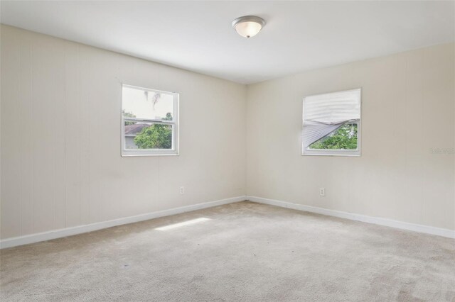 2814 W Humphrey St, Tampa, FL 33614 - carpeted spare room with baseboards