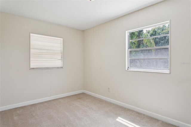 2814 W Humphrey St, Tampa, FL 33614 - unfurnished room featuring carpet flooring and baseboards