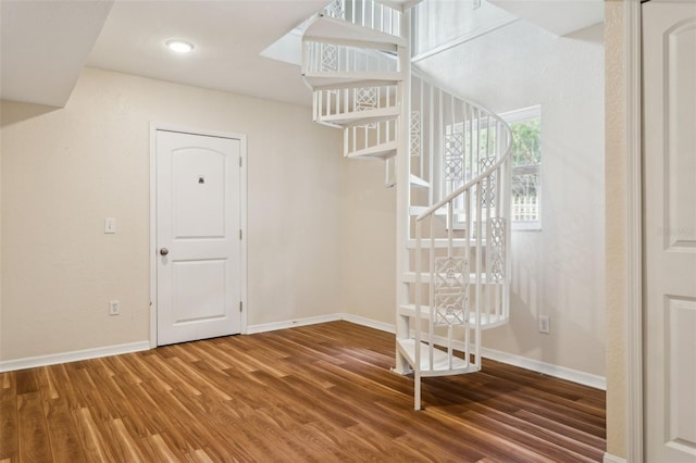 2814 W Humphrey St, Tampa, FL 33614 - stairway with wood finished floors and baseboards