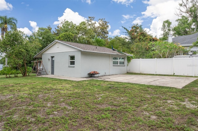2814 W Humphrey St, Tampa, FL 33614 - back of house featuring a patio, stucco siding, and stairway