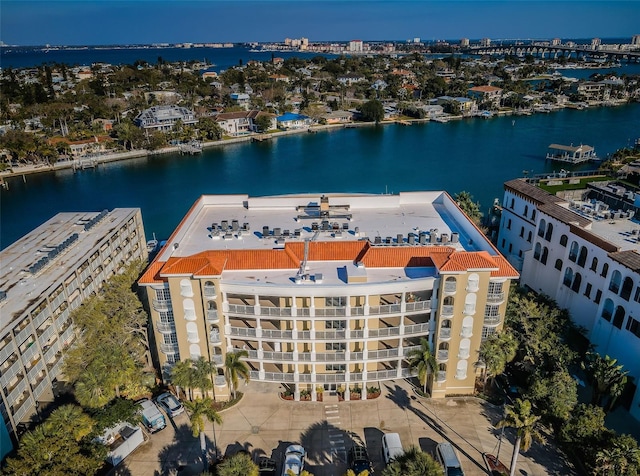 bird's eye view of a large body of water and apartment complex